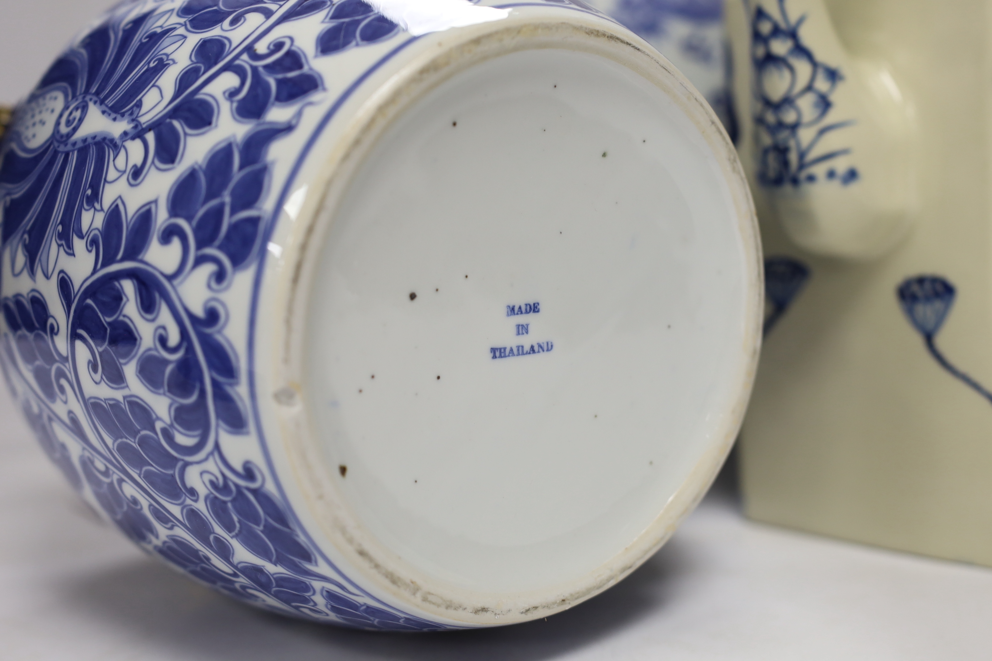 Four modern Chinese blue and white ceramic items; two teapots, a lidded vessel and a bowl, tallest 23.5cm